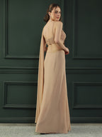 Tan Brown pre-drape georgette saree paired beautifully with a hand-embellished pearl blouse.
