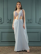 Powder Blue pre-drape georgette saree paired beautifully with a hand-embellished pearl blouse.
