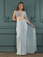 Powder Blue pre-drape georgette saree paired beautifully with a hand-embellished pearl blouse.