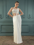 Pearl White pre-drape saree paired with a pearl-encrusted blouse.