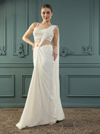Pearl White pre-drape saree paired with a pearl-encrusted blouse.