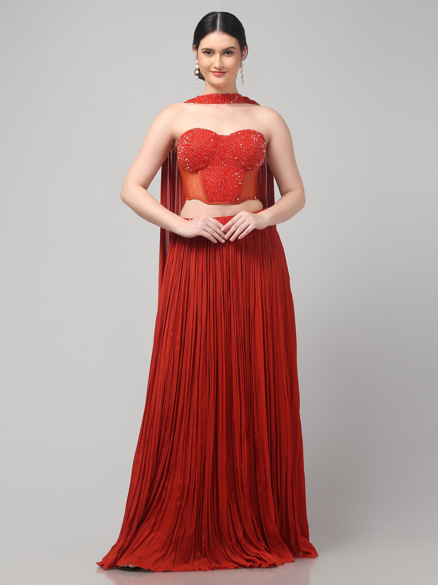 Rust Orange Corset with pleated Skirt & Dupatta