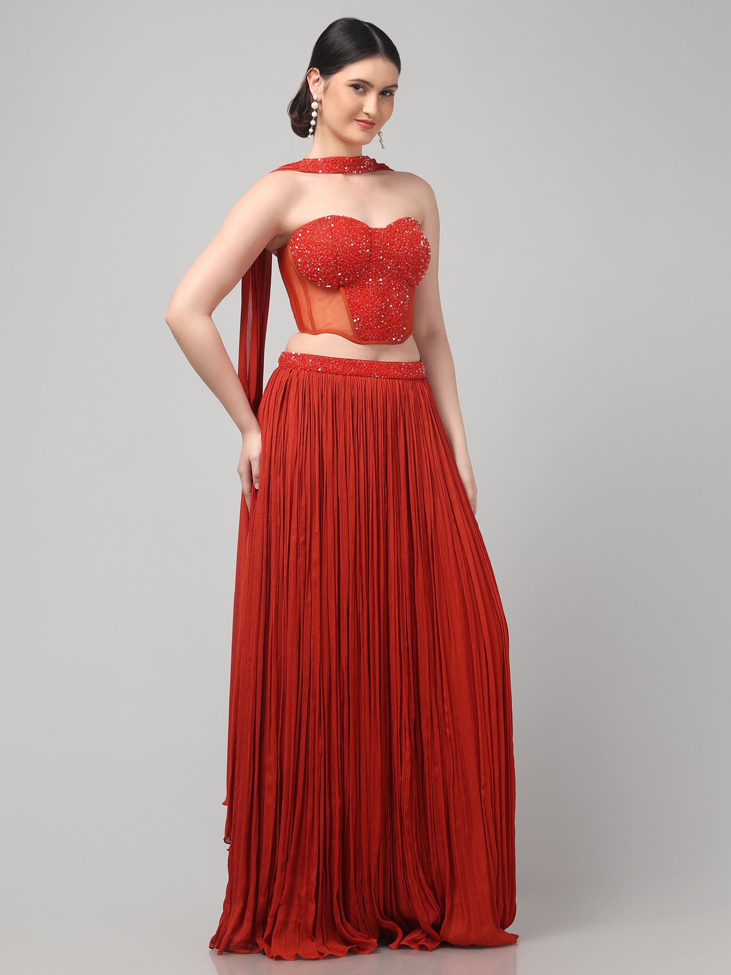 Rust Orange Corset with pleated Skirt & Dupatta