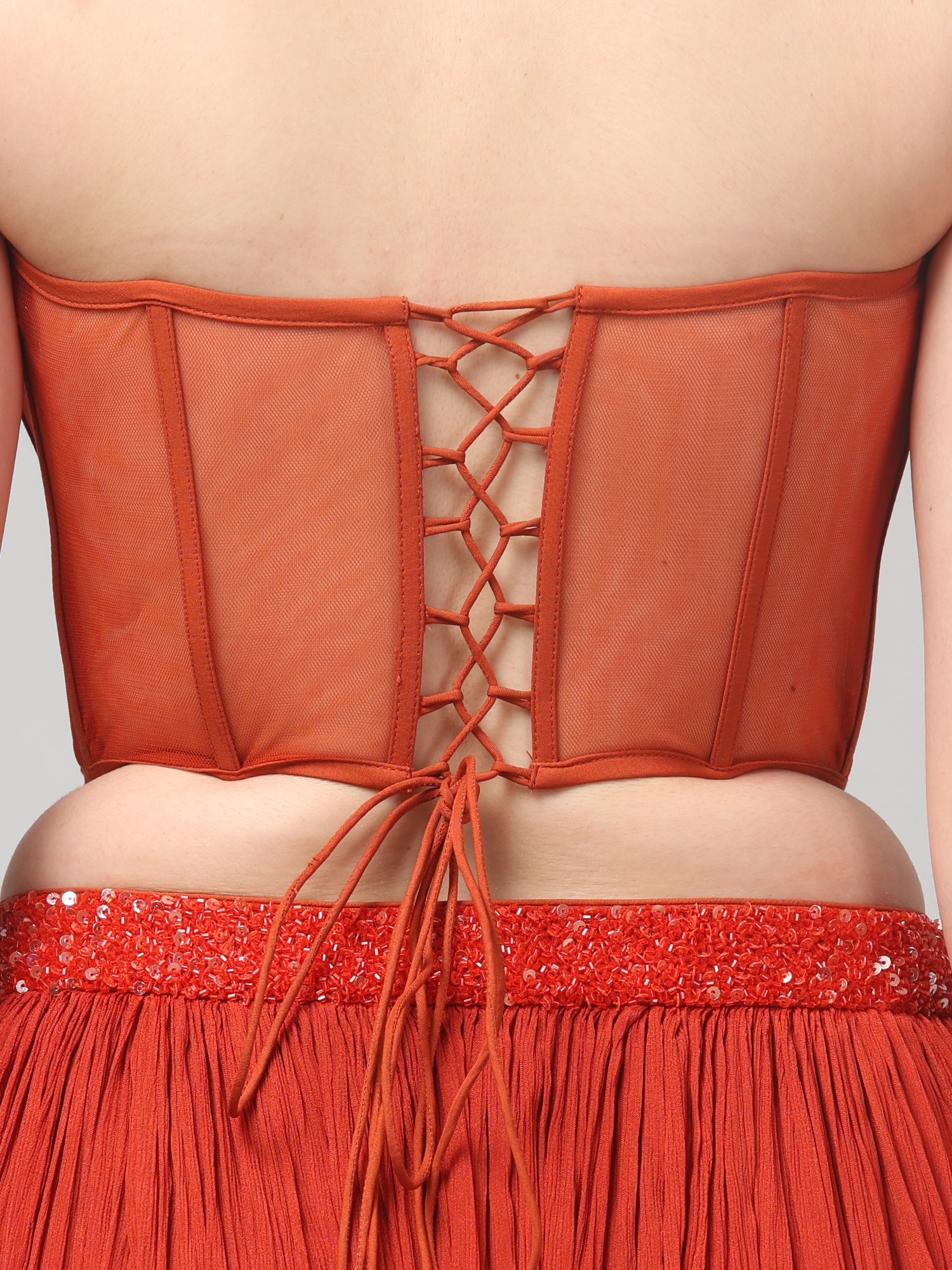 Rust Orange Corset with pleated Skirt & Dupatta